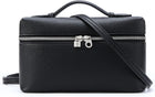 Black leather handbag with a shoulder strap on a white background